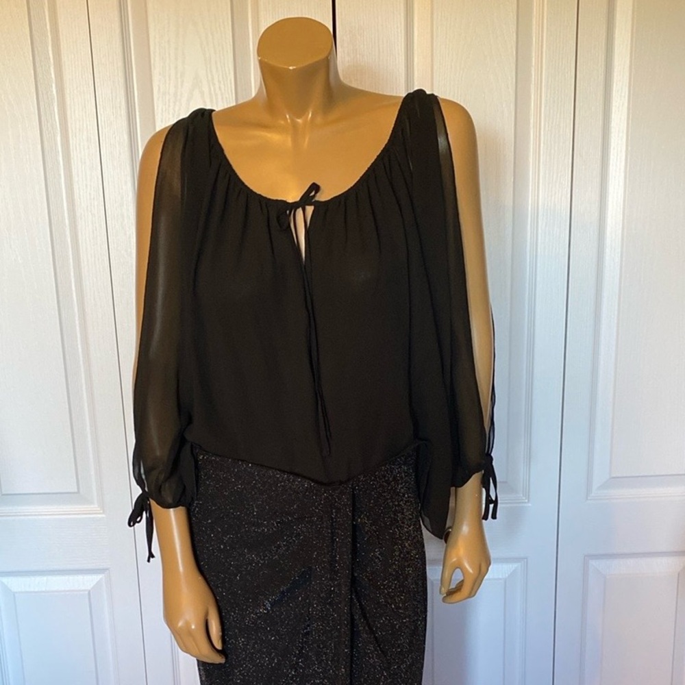 Beautiful black top by Vertigo Sz small. NWTS open arms tie at neck & wrist